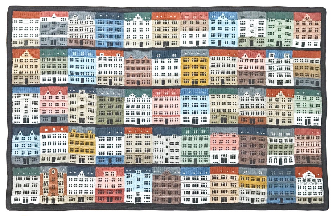 Completed knitted Copenhagen cityscape blanket by Jake Henzler